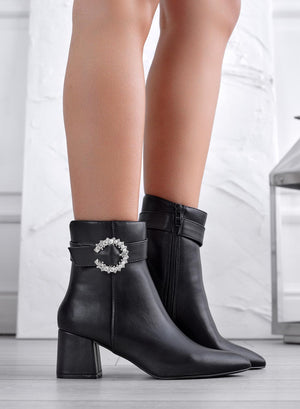 Black ankle boots with jeweled buckle