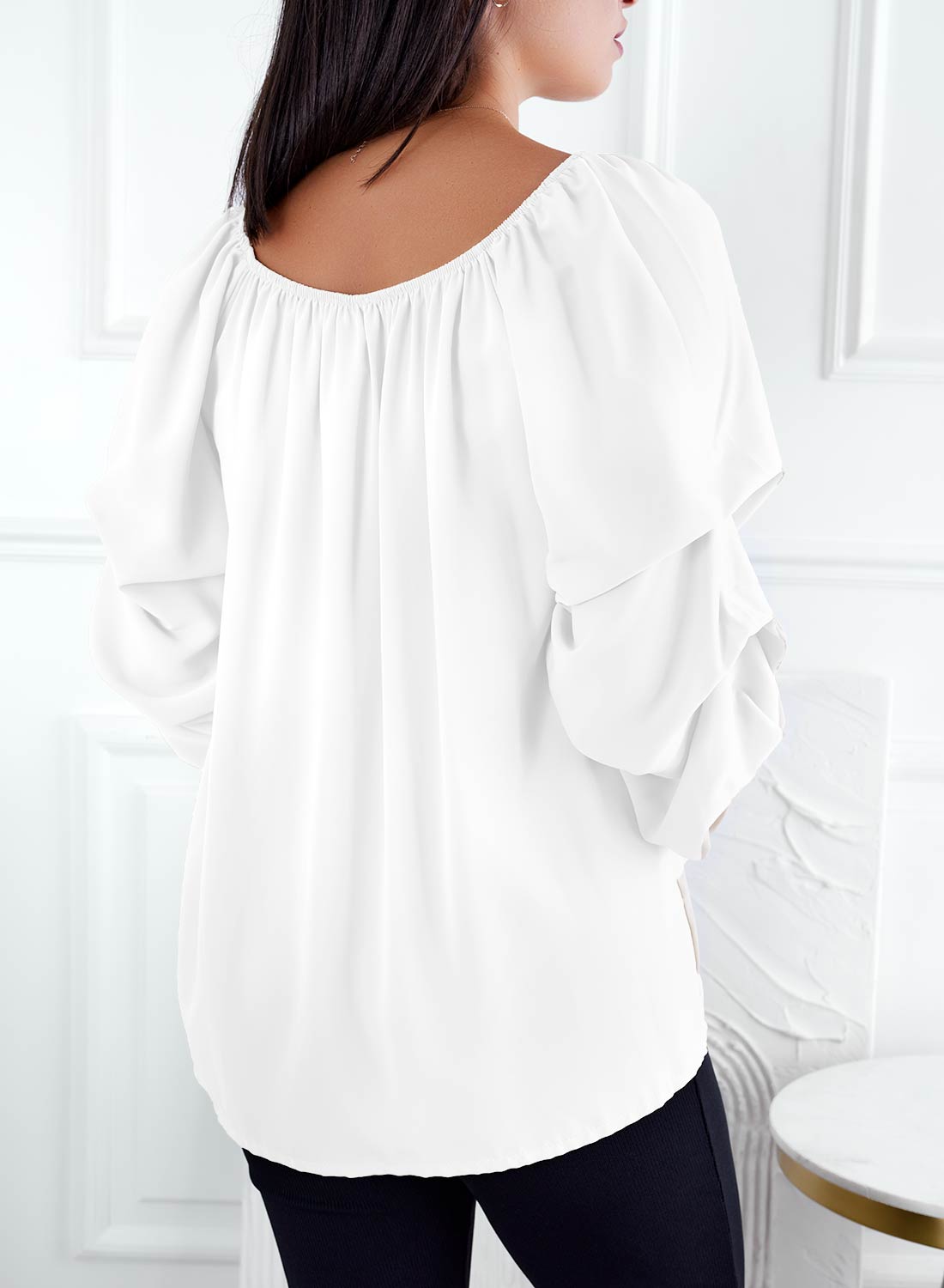 White blouse with ruched sleeves