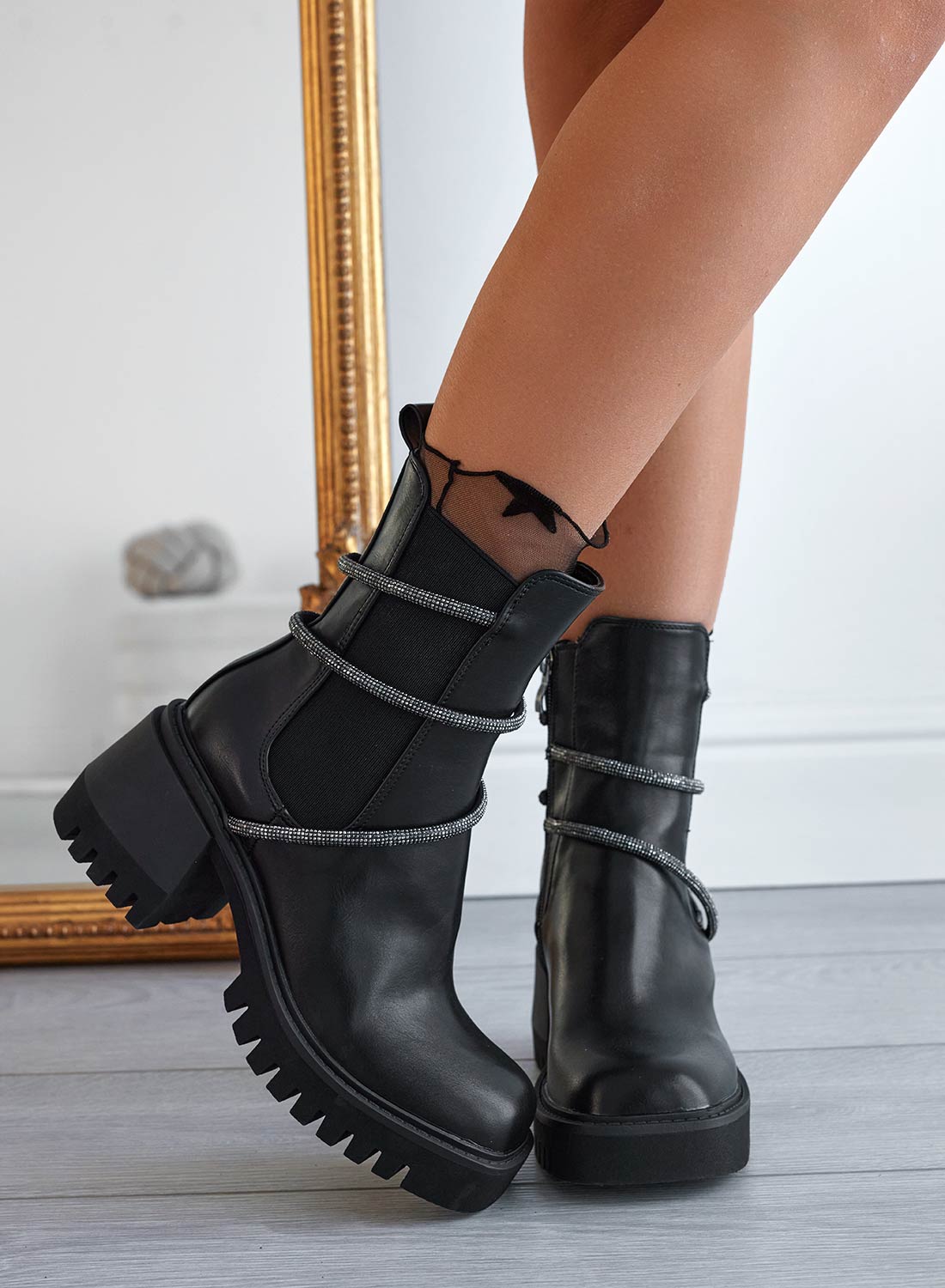 Black Alexoo ankle boots with elastic and rhinestones