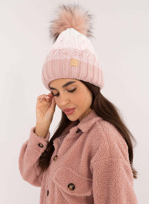 Pink hat with inner padding and pompom
