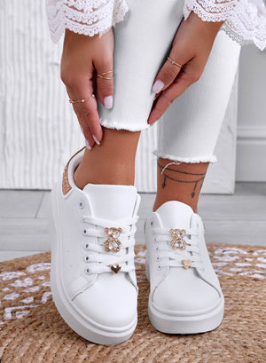 White sneakers with jewel appliqué and rose gold rhinestone heel