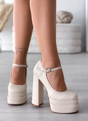 Beige Mary Jane pumps by Alexoo with high heel and platform