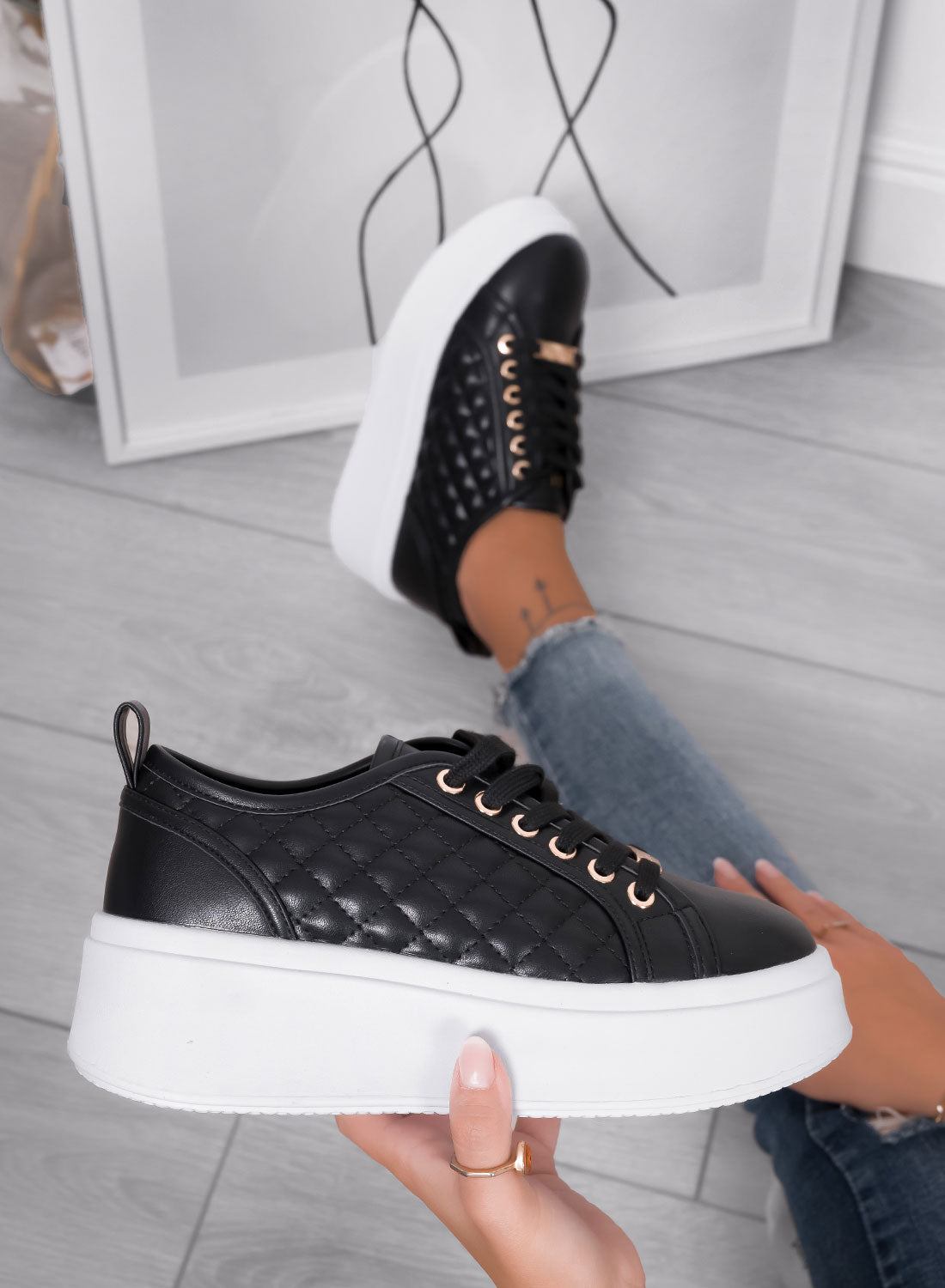 DALILA - Black quilted platform sneakers with high sole