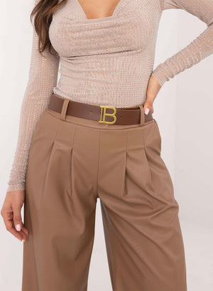 Faux leather flared trousers in mud color