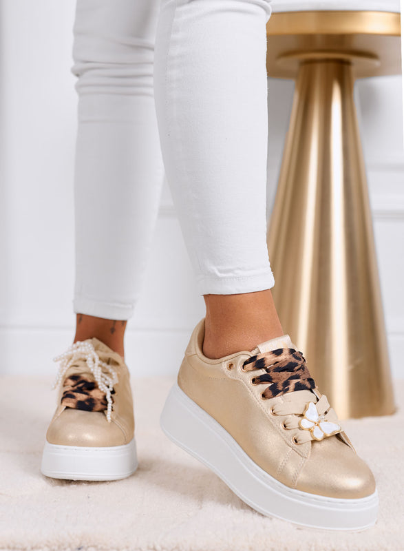 LAURA - Sneakers oro platform con lacci animalier e dettagli gioiello