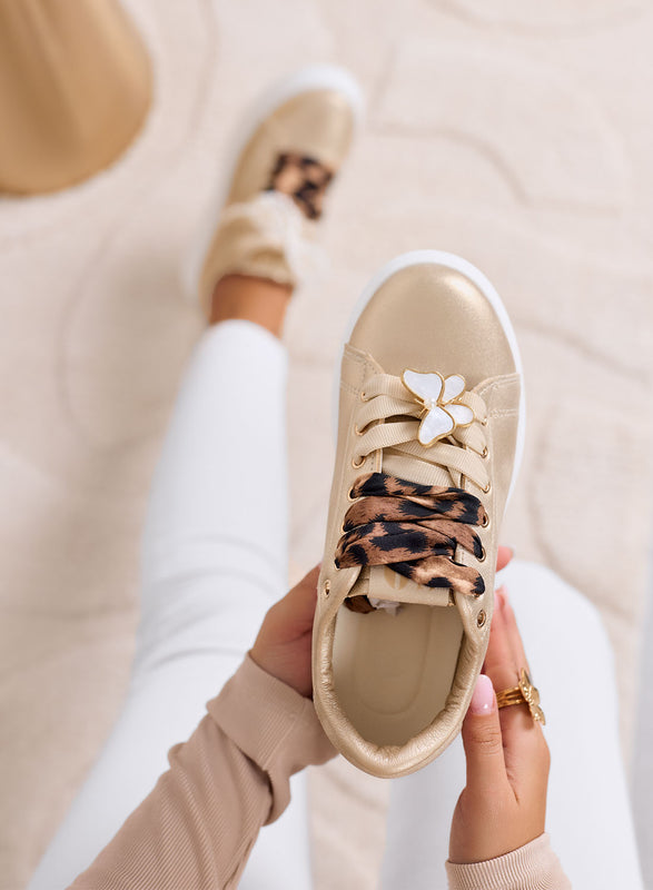 LAURA - Sneakers oro platform con lacci animalier e dettagli gioiello