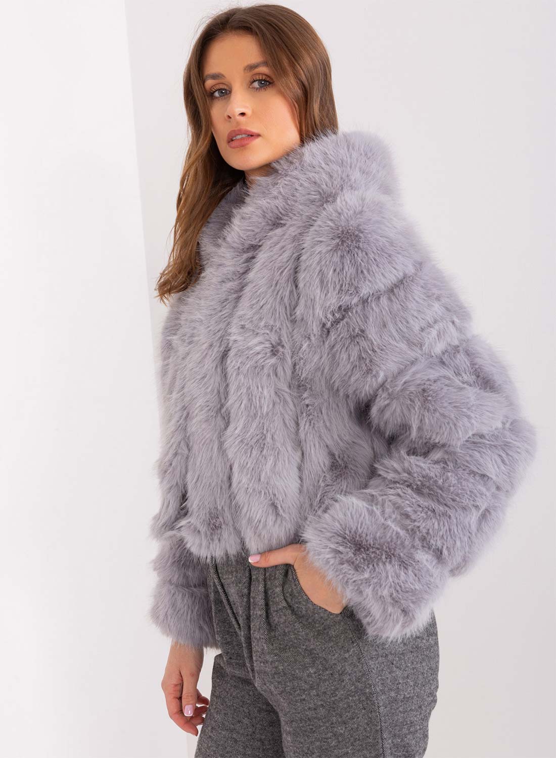 Short faux fur jacket with long-haired gray hood