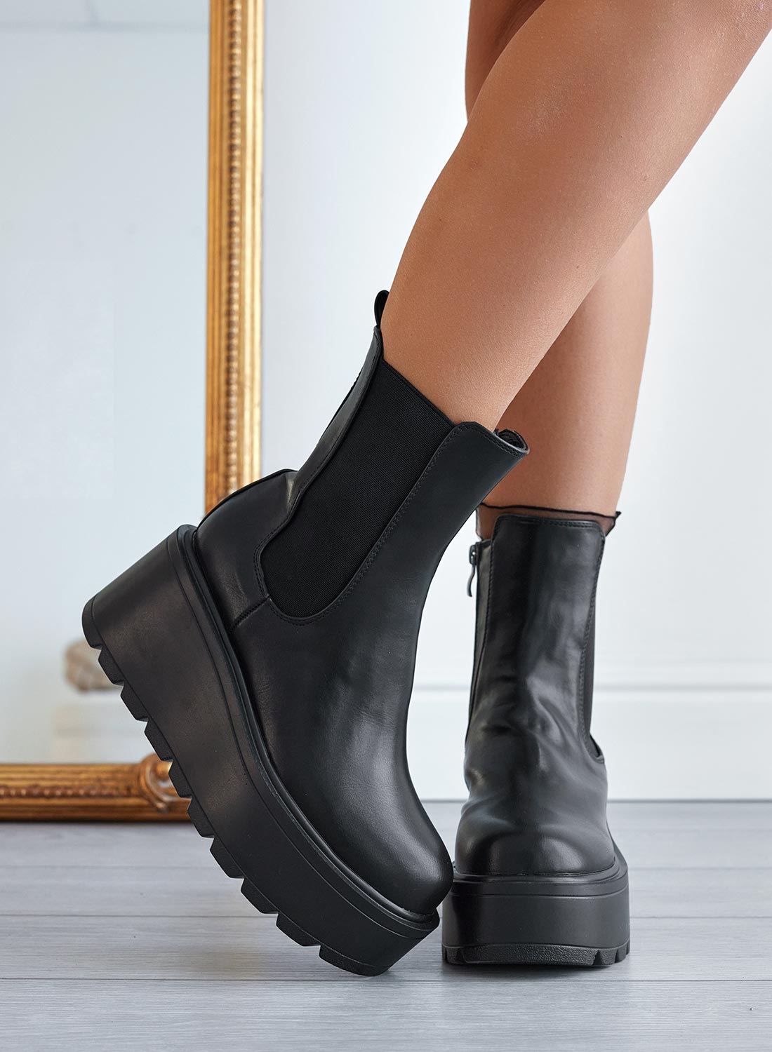Alexoo black ankle boots with wedge heel and side elastic