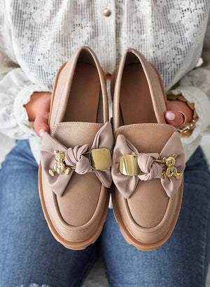 Mud loafers with bow and gold applications