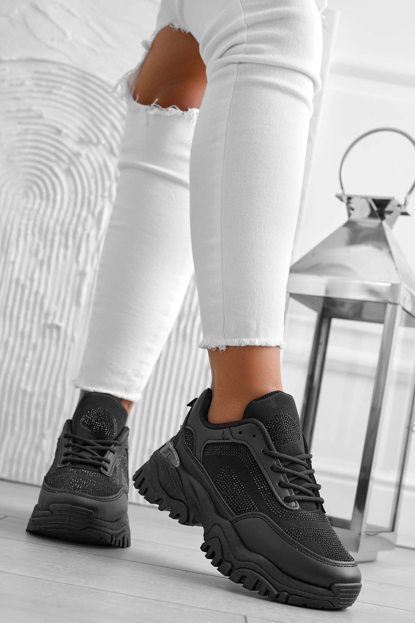 Black sneakers with thick sole and rhinestones