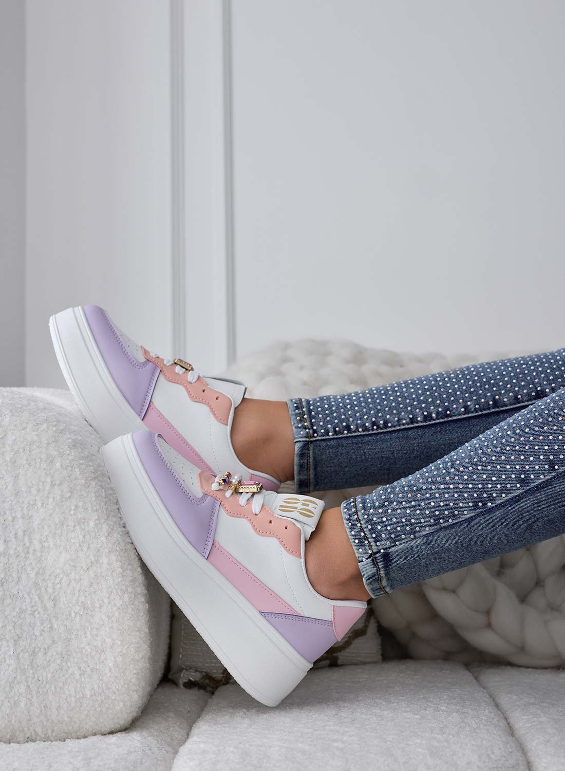 White sneakers with lilac inserts and jewel applications