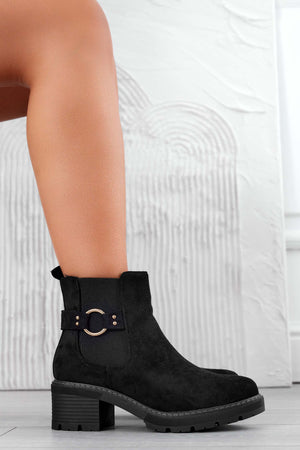 Black suede ankle boots with gold accessory