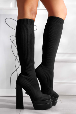 Black boots in ribbed stretch fabric