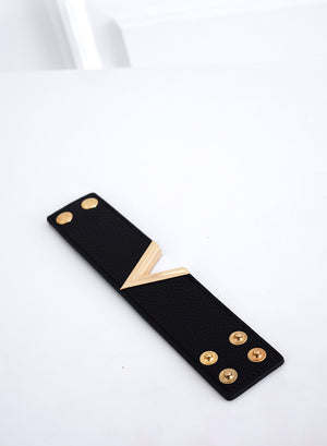 Black bracelet with gold V