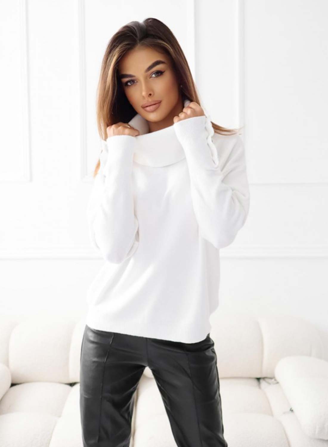 White shirt with pearl buttons on the cuffs