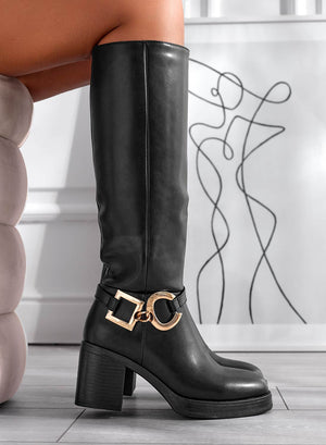 Black boots with gold embellishments