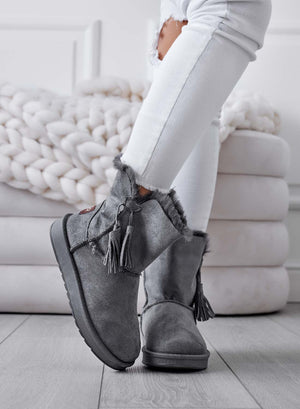 Grey padded ankle boots with tassels