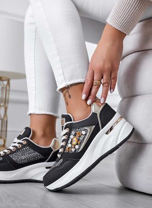 Black sneakers with fabric inserts and jewels