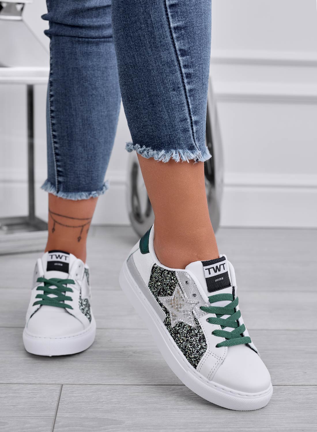 White sneakers with star and green glitter inserts