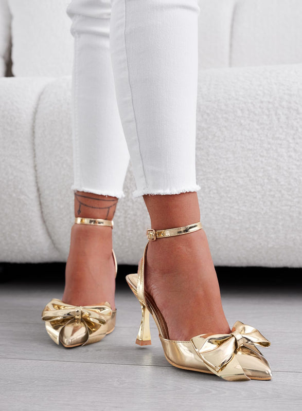 MIRABEL - Decolletè oro metallizzate aperte con cavigliera e fiocco