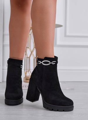 Black ankle boots with silver jewel embellishment