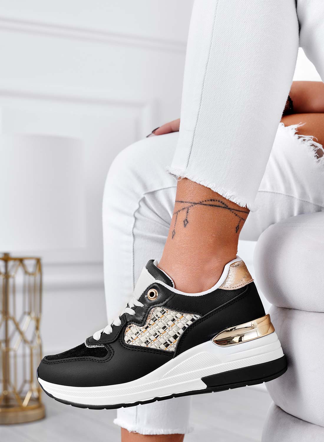 Black sneakers with fabric inserts