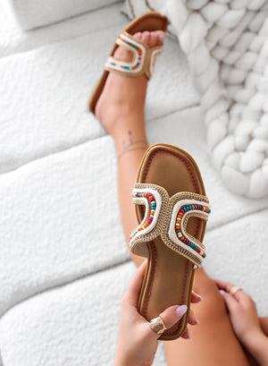 Beige slide sandals with multicolor stones