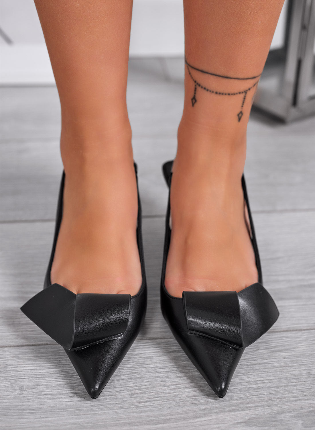 LORENA - Décolleté slingback nere con maxi fiocco e tacco geometrico