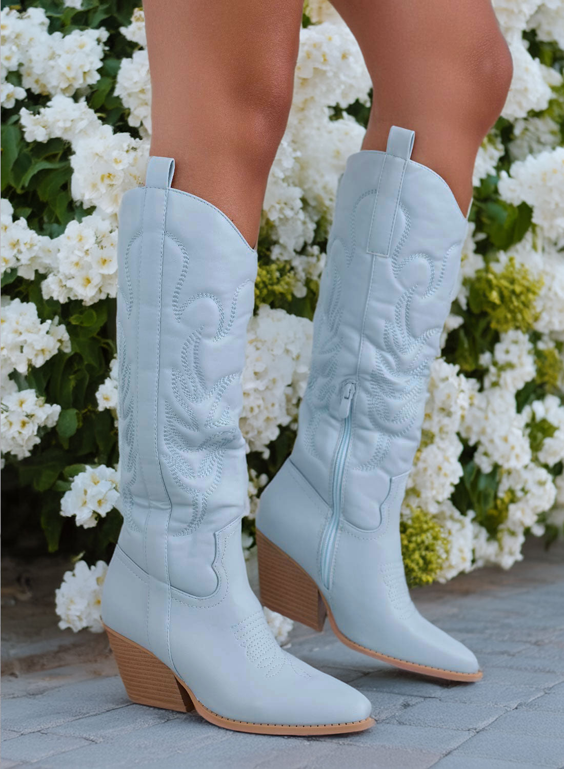 Light blue camper boots with embossed embroidery