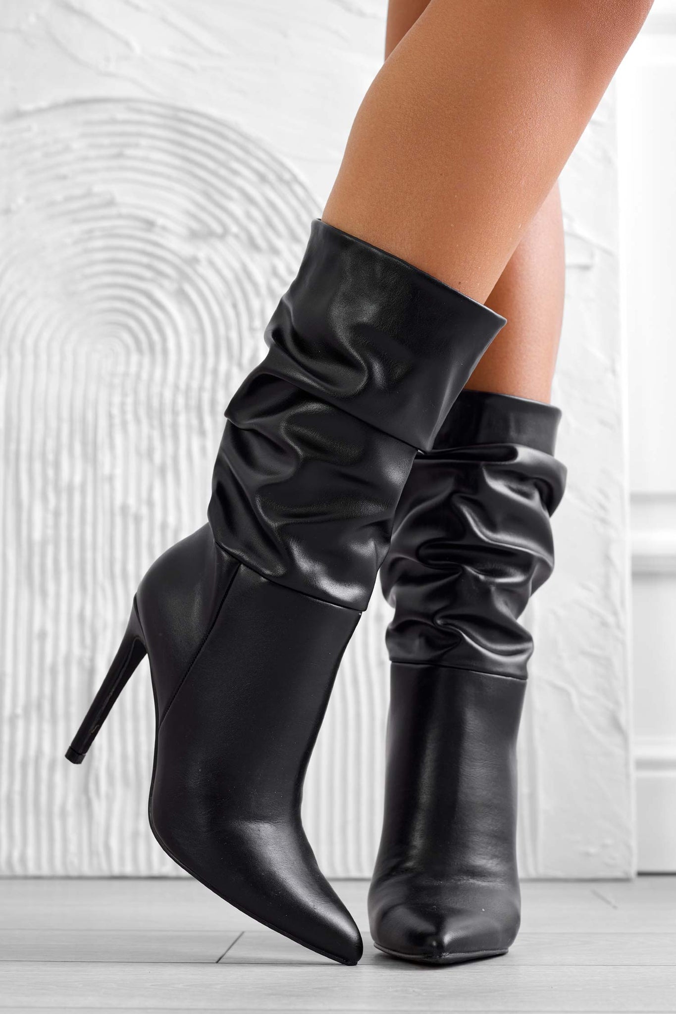 Black ankle boots in faux leather with high heel