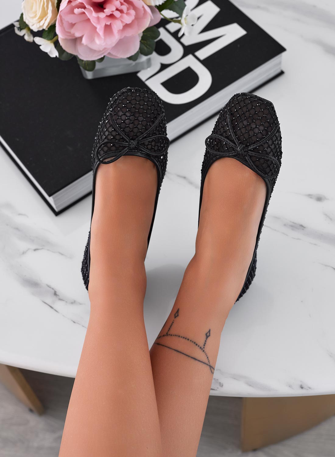 Ballerine nere a rete con fiocco e strass