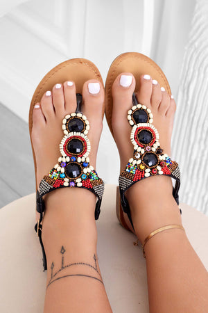 Black flat thong sandals with multicolor stones