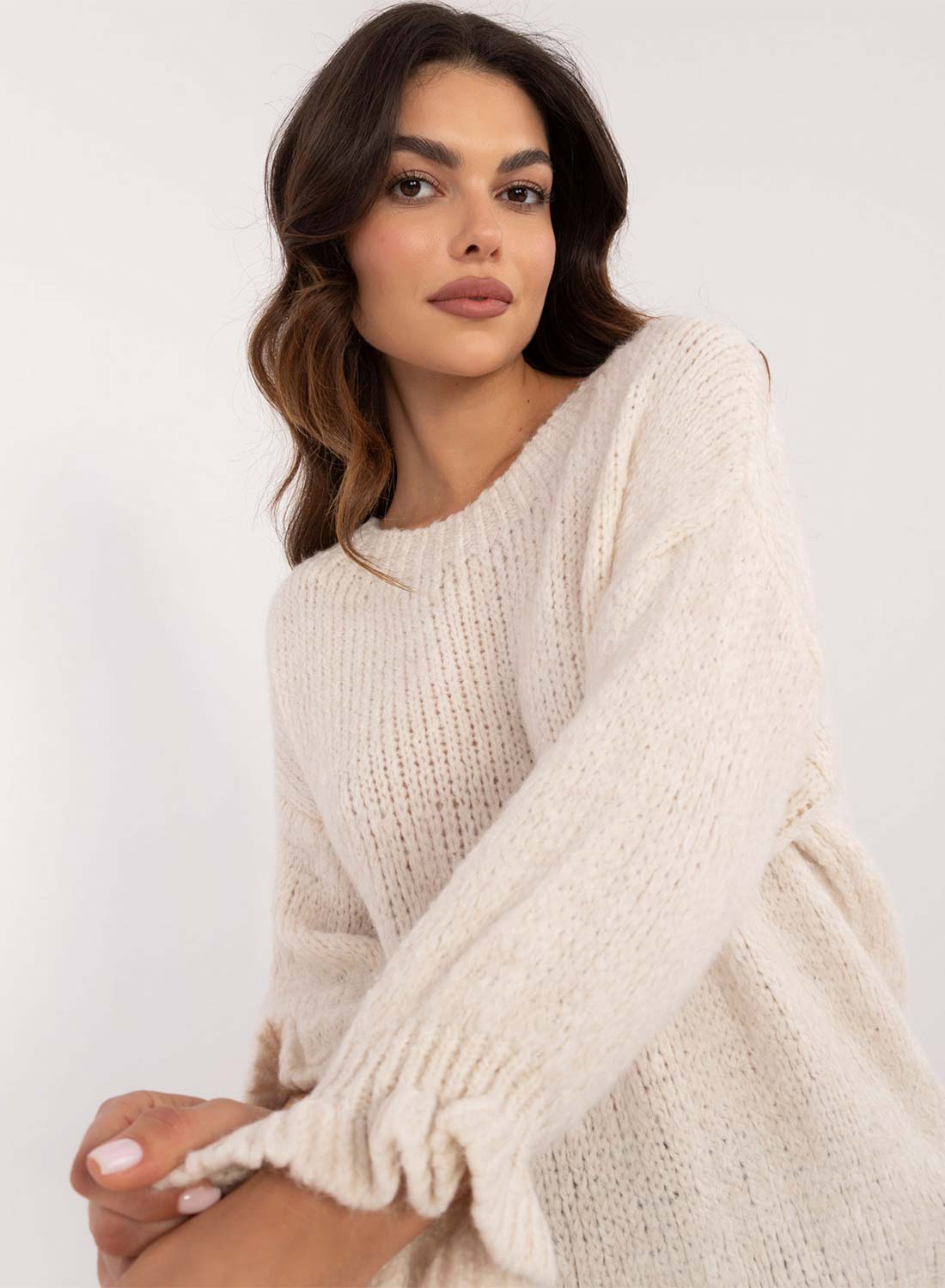 Cream sweater with ruched sleeves