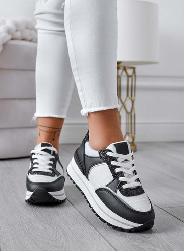 Black sneakers with glitter inserts
