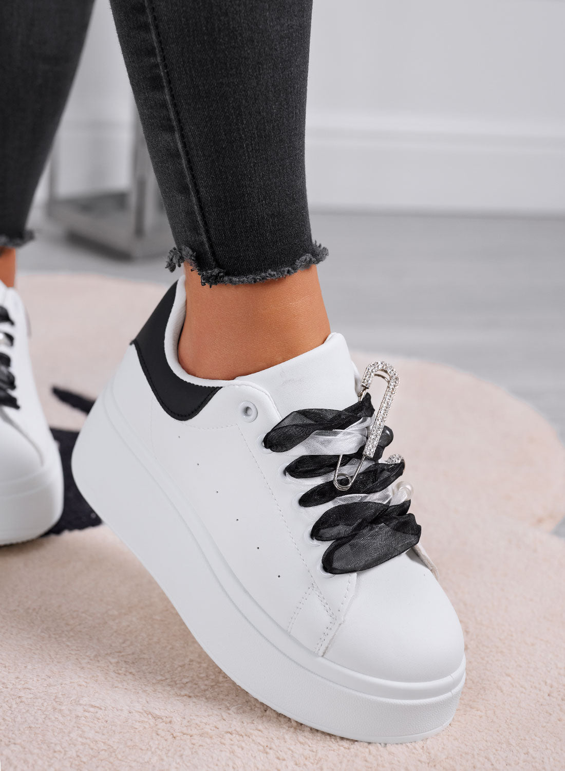 ANGY - White platform sneakers with black organza laces and jeweled brooch