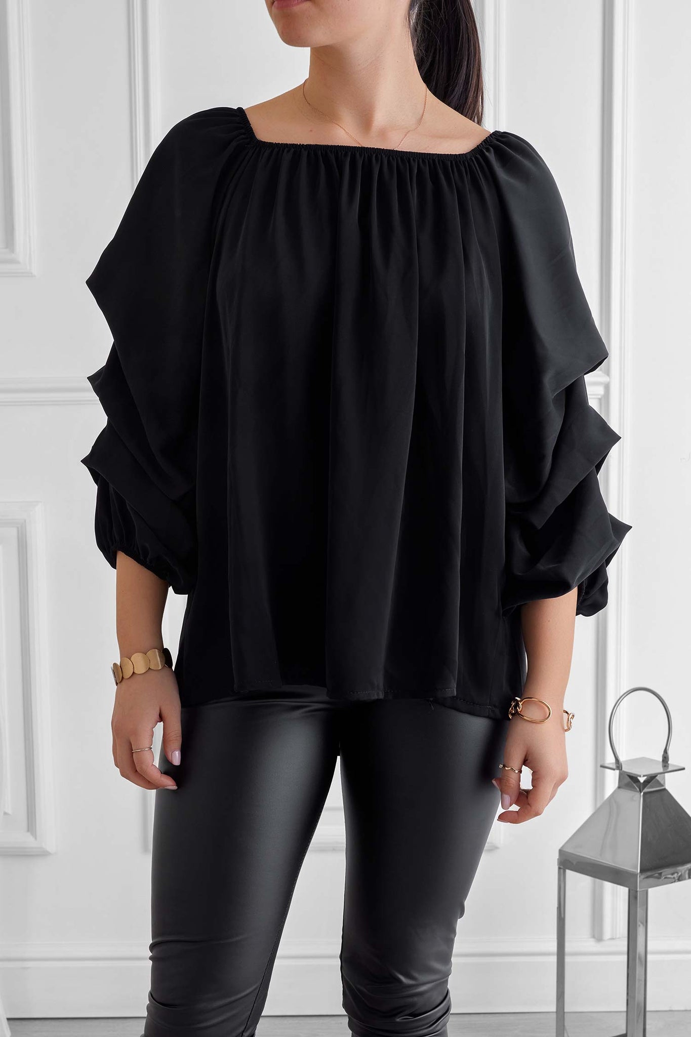 Black blouse with ruched sleeves