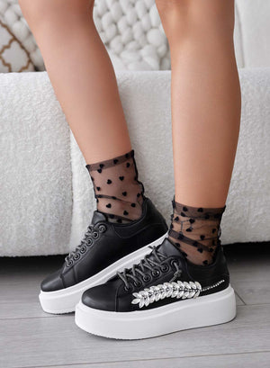 Black sneakers with jewel embellishments