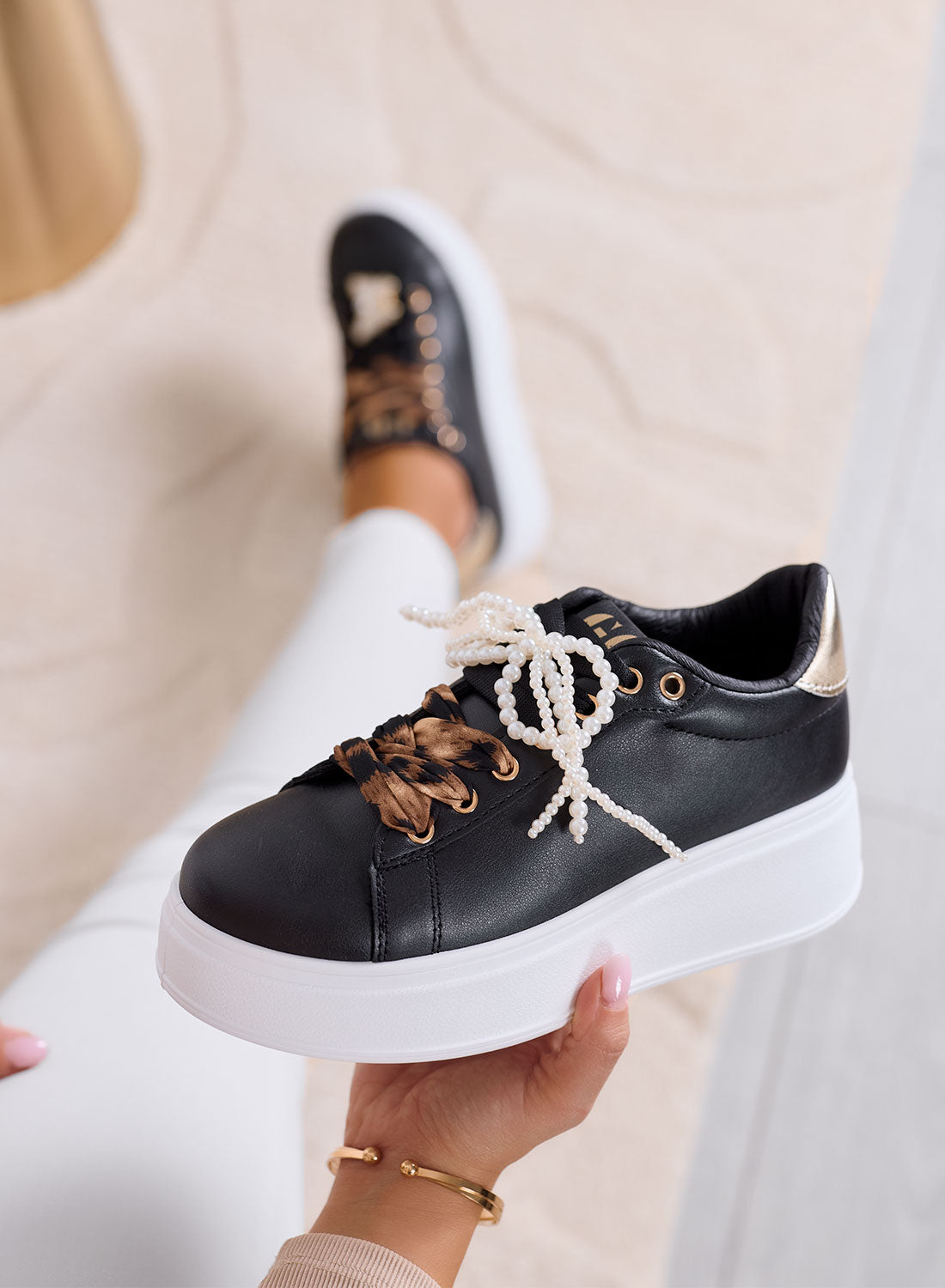 LAURA - Black platform sneakers with animal print laces and jewel details