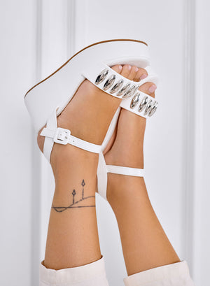 GWENDA - White platform sandals with large silver studs and ankle strap
