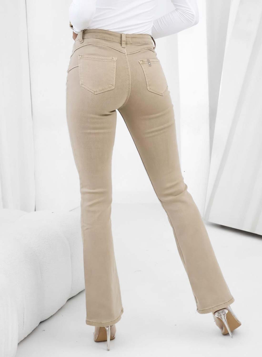 Beige flared jeans trousers