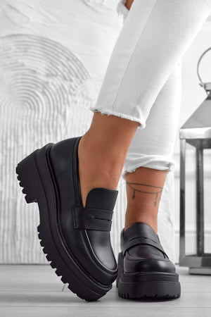 Black loafers with thick sole