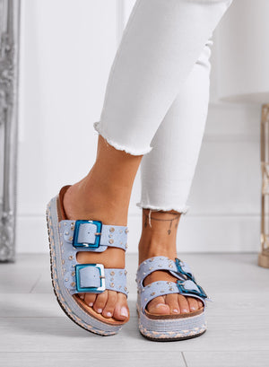 MOANA - Blue platform sandals with blue buckles, studs, and rhinestones
