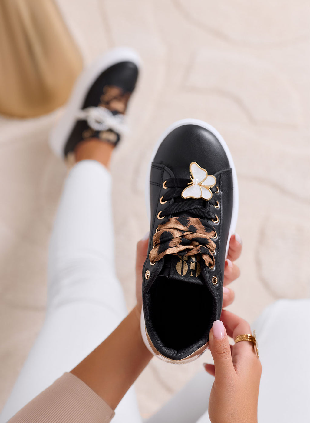 LAURA - Black platform sneakers with animal print laces and jewel details