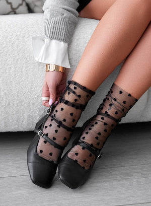 Black slingback Mary Jane pumps