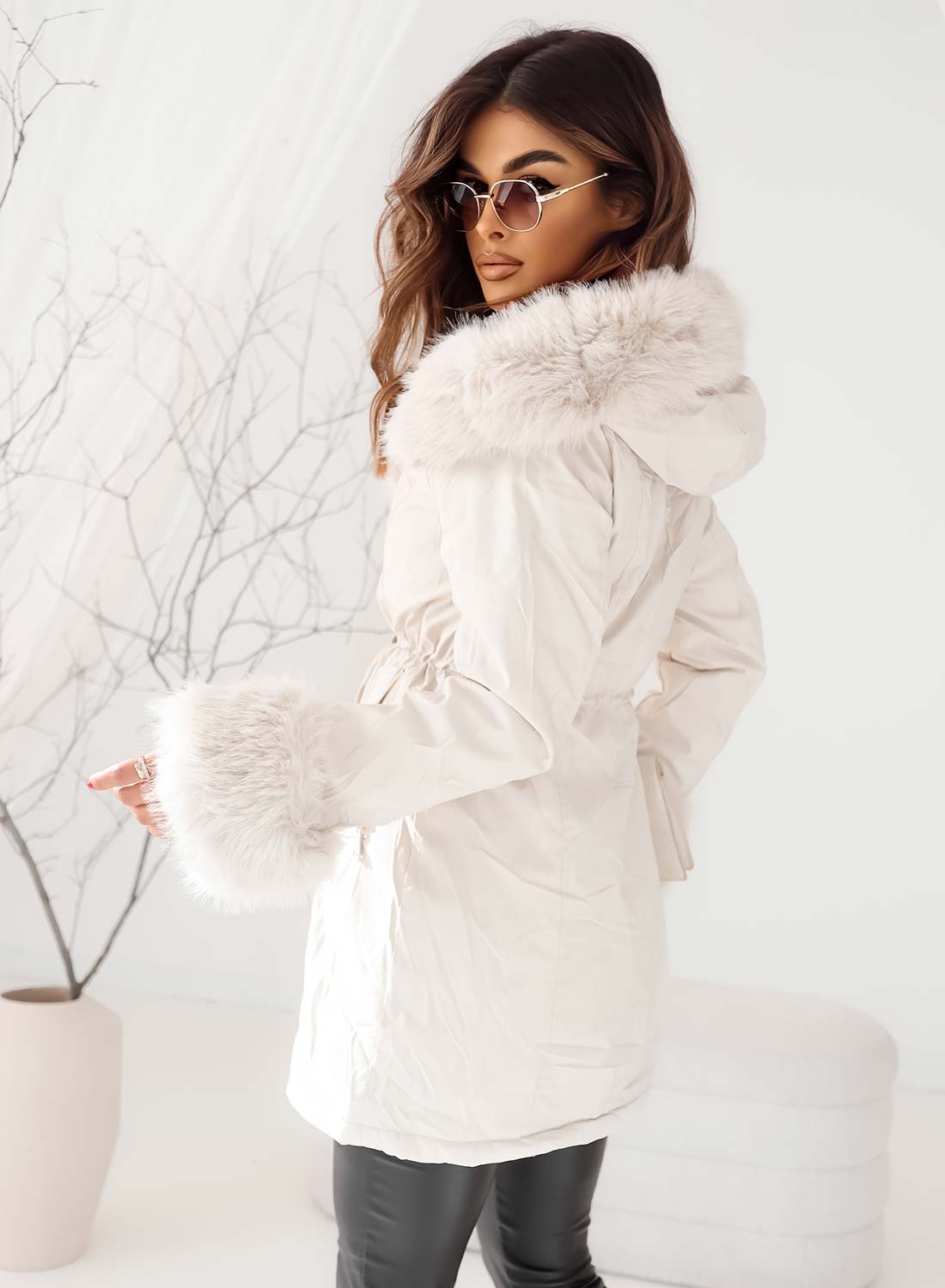 Padded cream jacket with hood and faux fur sleeves