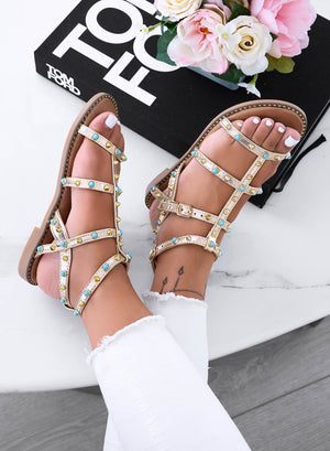 RAYLEE - Low gold sandals wrapped with studs