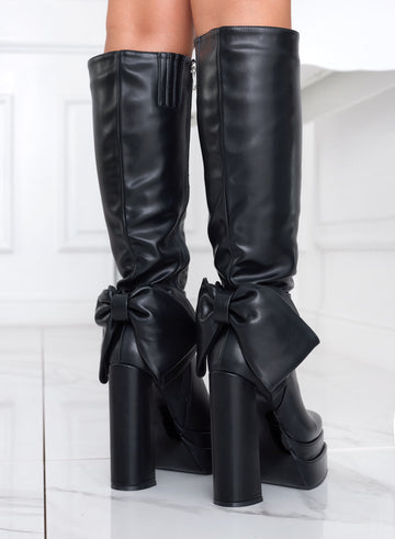 Black platform boots with bow and high heel