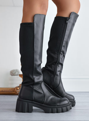 Black boots with stretch fabric at the back