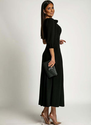 One-shoulder black dress with side slit