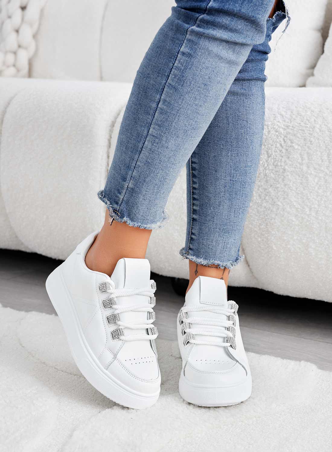 White sneakers with rhinestone inserts